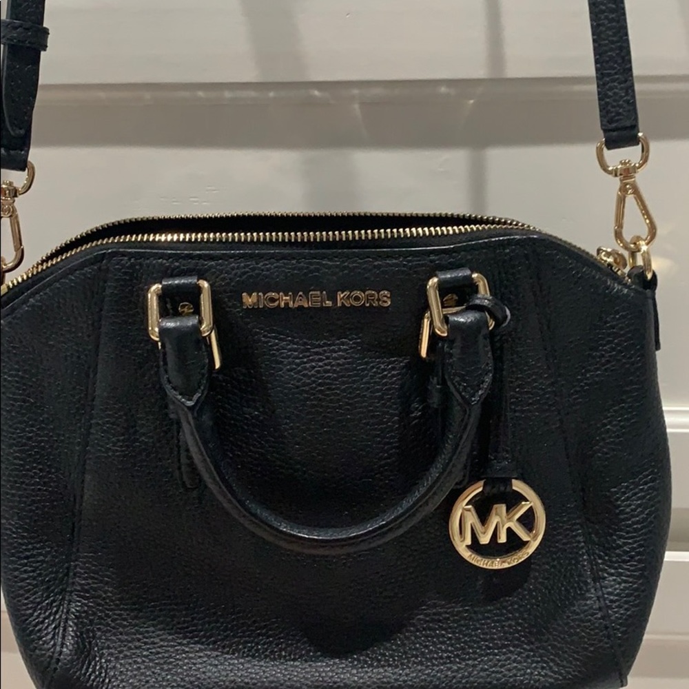 MK black medium pebble leather handbag with strap